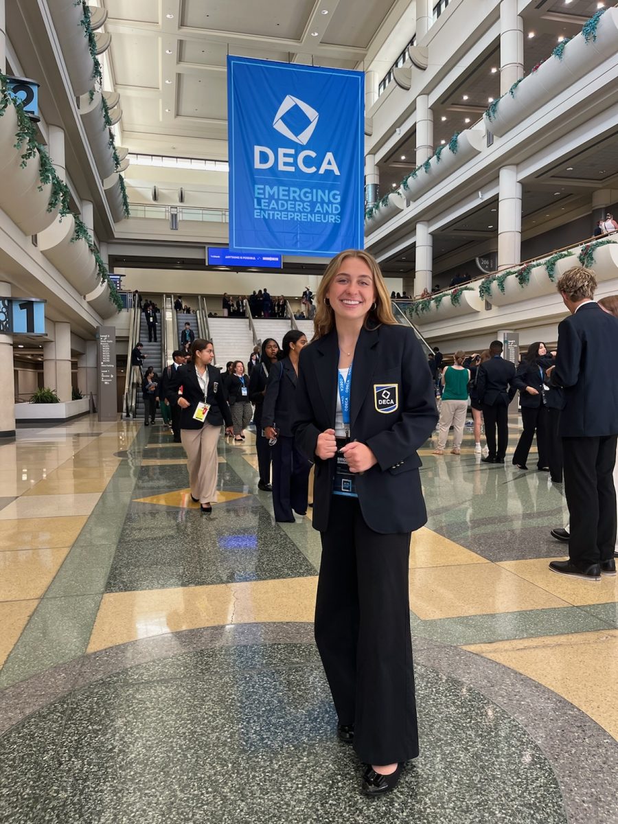 Senior and business Sterling Scholar Brighten Braegger attends a DECA competition. DECA is a organization that prepares students for careers in marketing, finance, hospitality and management. Photo provided by Brighten Braegger.