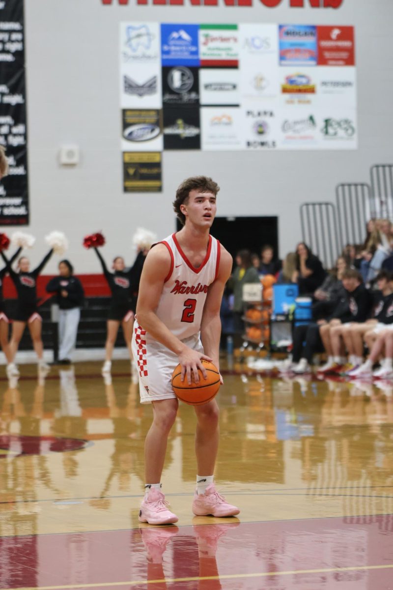 Senior Derik Bowden gets ready for a free throw at the game against Freemont on Dec. 9. The team won with a score of 69-66.